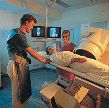 The doctor and technologist assure a patient before angiography